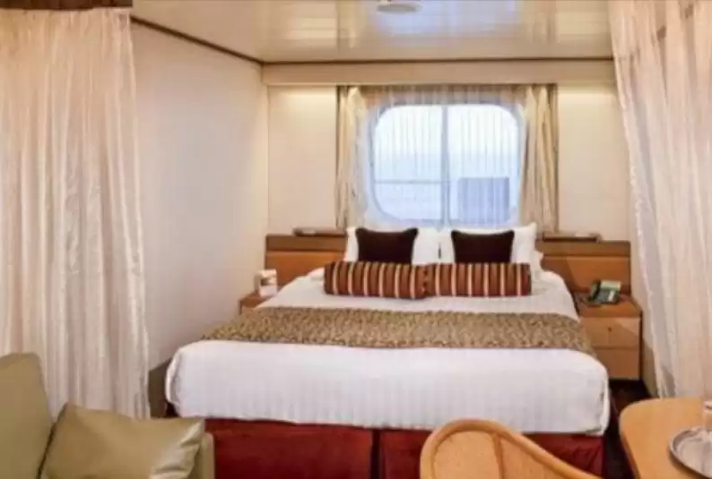 Gran Cabina Ojo de Buey vista al mar
